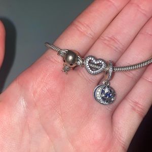Perfect condition pandora charm bracelet! Selling with all 3 charms.